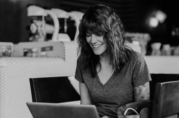 woman business owner working on laptop